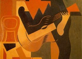 Arlequin assis à la guitare