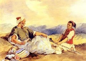 Deux marocains assis dans la campagne 